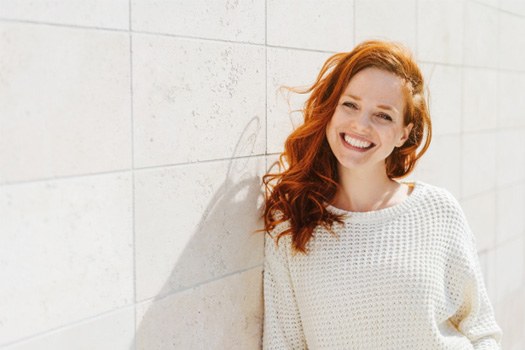 Woman smiling outside